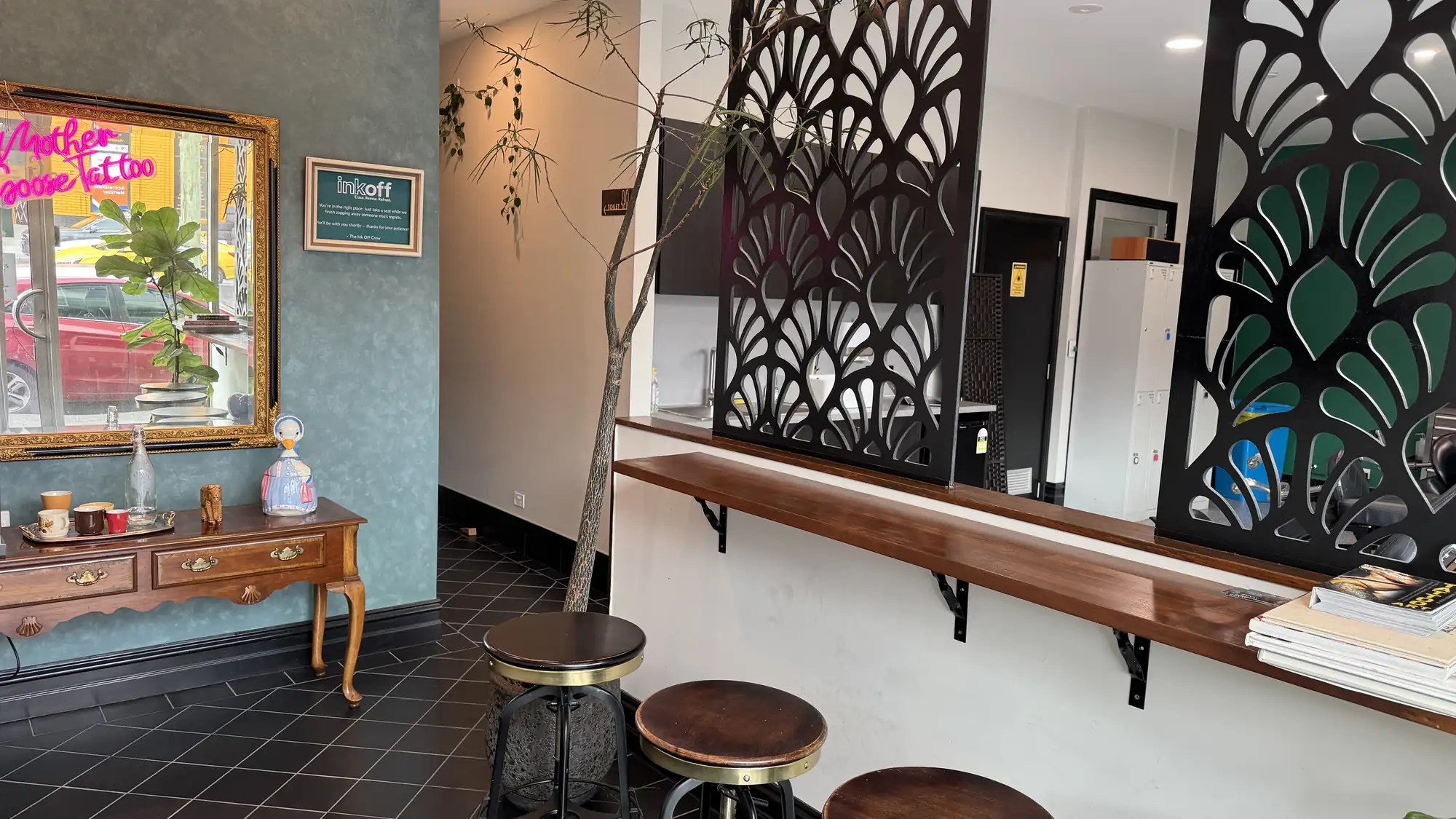 The calm waiting area at the Ink Off clinic in Kensington, Melbourne